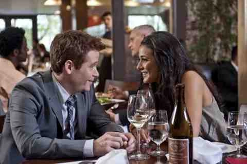 Kevin Connolly as Eric and Emmanuelle Chriqui as Sloan